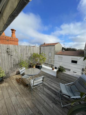 Maison de ville avec terrasse